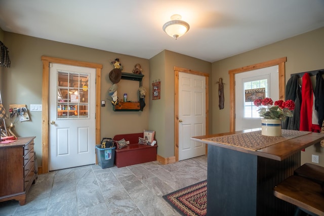 kitchen with a peninsula and a breakfast bar area