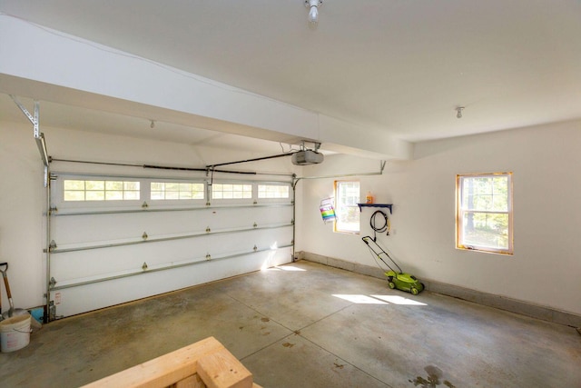 garage featuring baseboards and a garage door opener