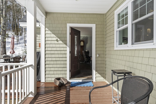 wooden terrace featuring a porch