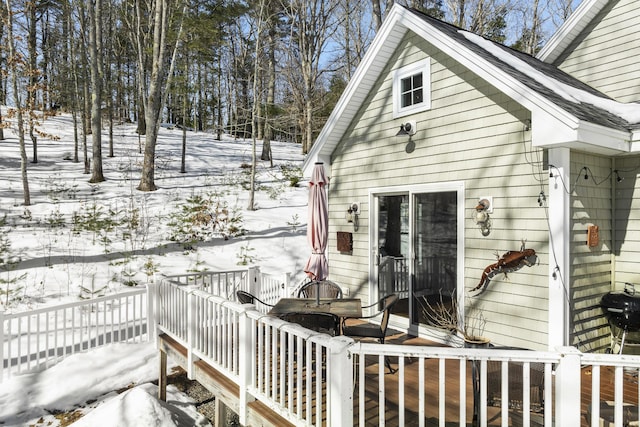 view of snow covered deck