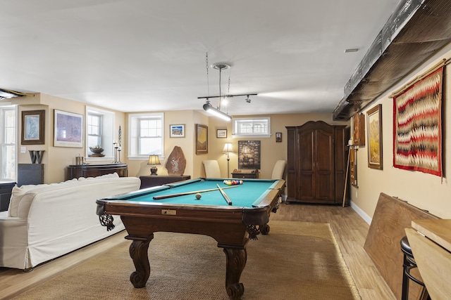 rec room with light wood-style flooring, baseboards, track lighting, and pool table