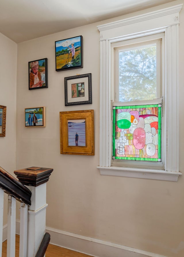 interior details with wood finished floors and baseboards