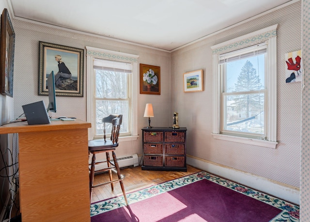 office area with a baseboard radiator, wood finished floors, baseboards, and wallpapered walls