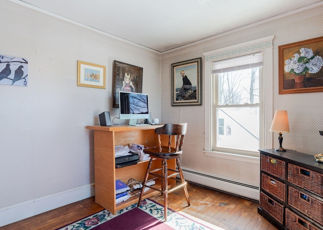 office area featuring wallpapered walls, baseboards, hardwood / wood-style flooring, a baseboard radiator, and ornamental molding