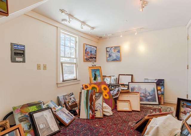 interior space featuring rail lighting