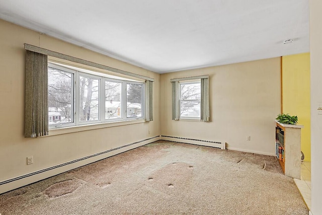 carpeted empty room with a baseboard radiator