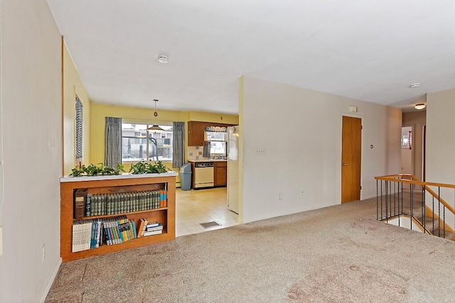 living room with light colored carpet and visible vents