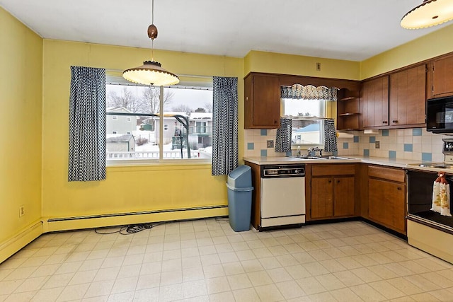 kitchen featuring range with electric cooktop, white dishwasher, light countertops, baseboard heating, and black microwave