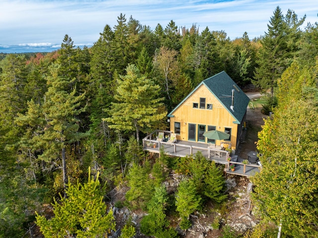 bird's eye view featuring a forest view