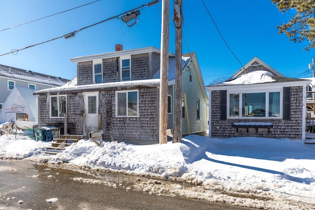 view of front of home with a chimney