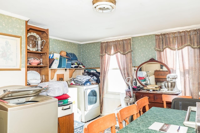 washroom featuring wallpapered walls, laundry area, crown molding, and washing machine and clothes dryer