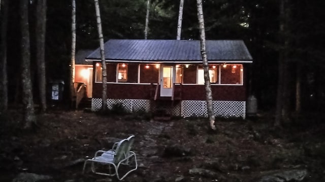 view of front of house with metal roof