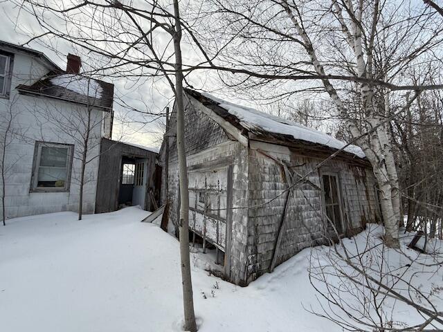 view of snow covered property