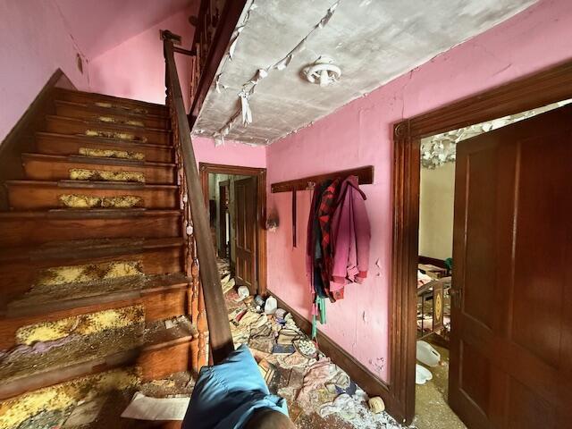 miscellaneous room featuring stairs