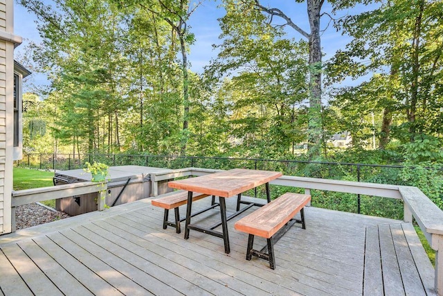 wooden deck featuring outdoor dining area