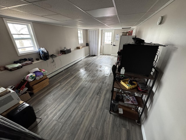 3 Jack St, Winslow, ME 04901 - interior space with baseboards, wood finished floors, a drop ceiling, and baseboard heating