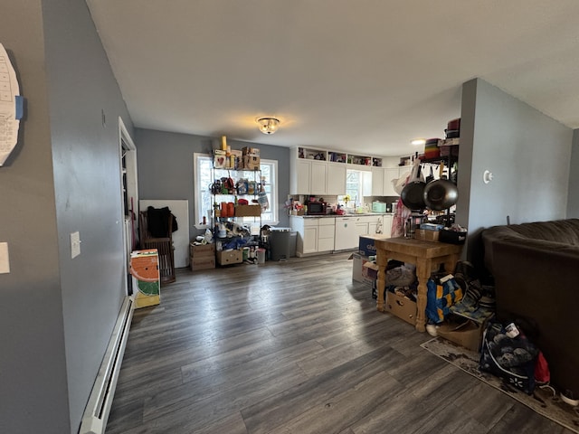 3 Jack St, Winslow, ME 04901 - interior space featuring dark wood-style floors and a baseboard radiator