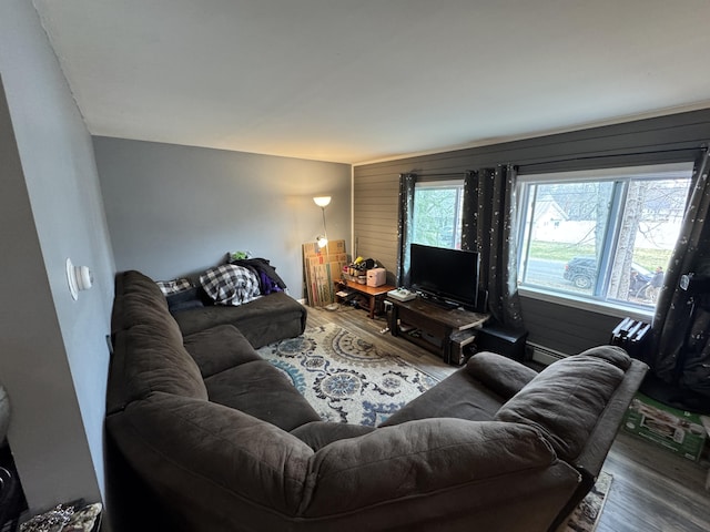 3 Jack St, Winslow, ME 04901 - living area featuring baseboard heating and wood finished floors