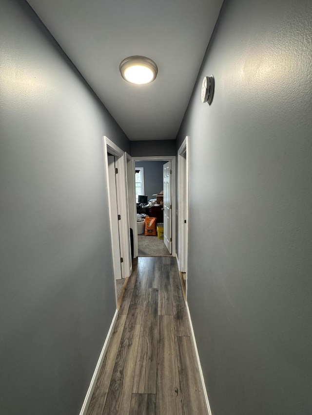 3 Jack St, Winslow, ME 04901 - hallway featuring baseboards and dark wood-type flooring