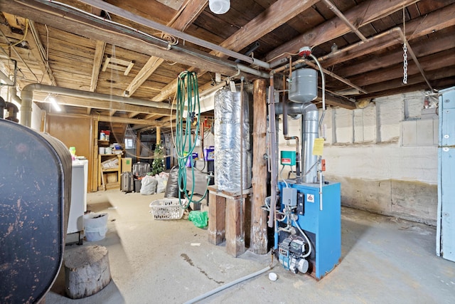 unfinished basement with heating fuel and a heating unit