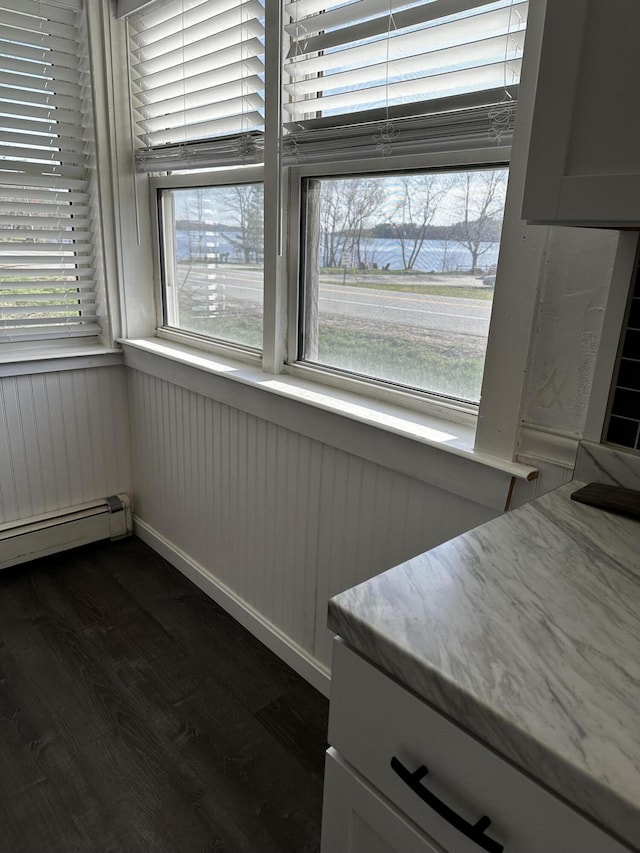 5 Pleasant View Ridge Rd, China, ME 04358 - unfurnished dining area with wainscoting, dark wood finished floors, and plenty of natural light