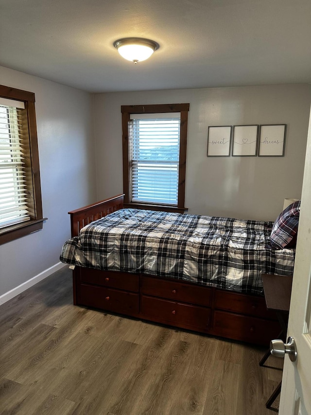 5 Pleasant View Ridge Rd, China, ME 04358 - bedroom featuring baseboards and dark wood-style floors