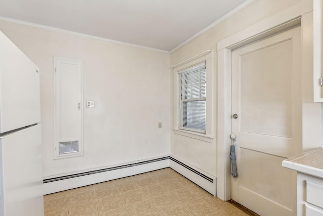 entryway featuring a baseboard radiator and crown molding