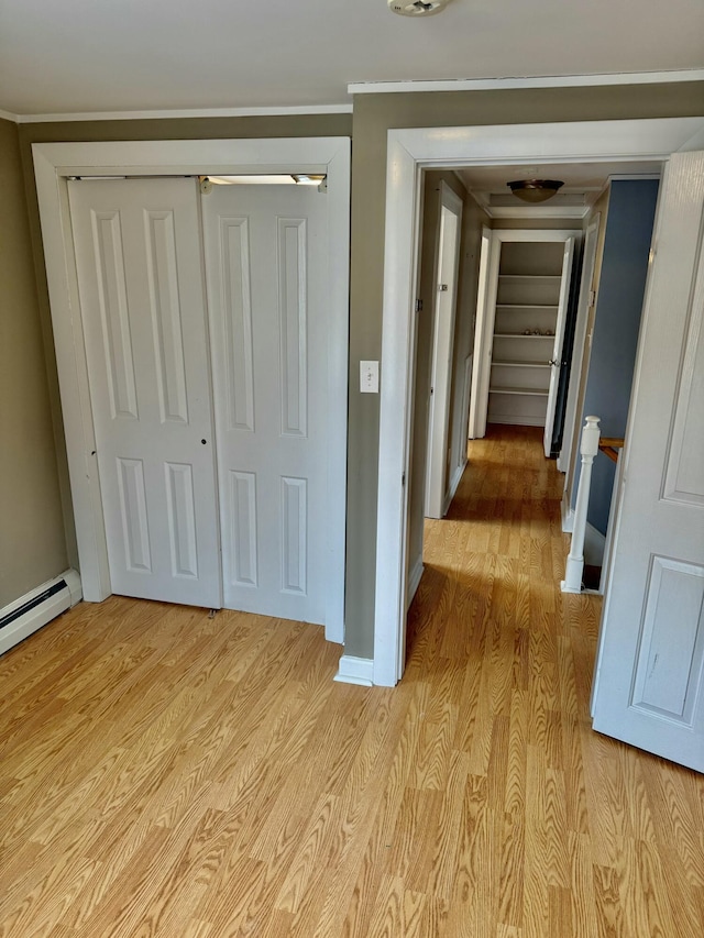 hallway with light wood-style flooring