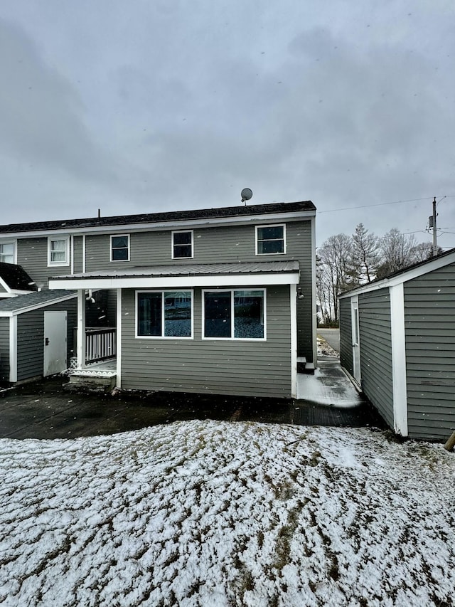 view of snow covered property