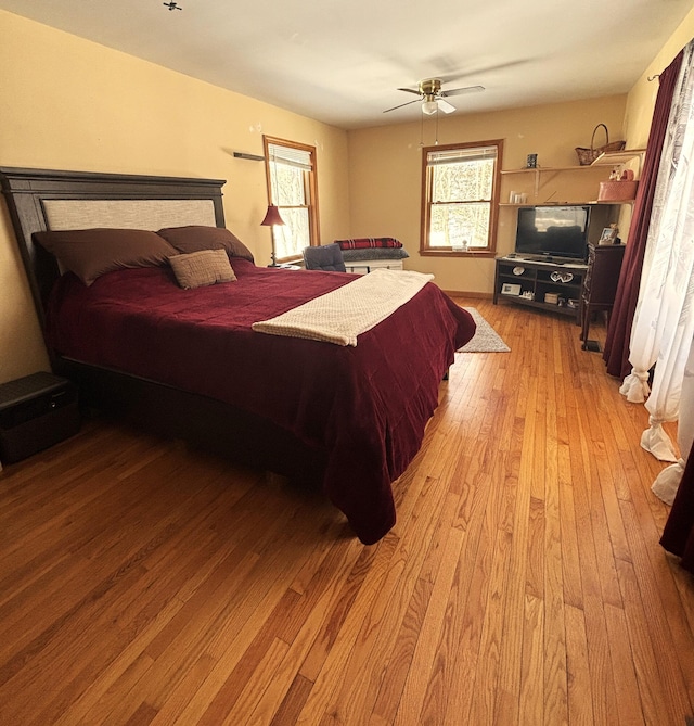 bedroom featuring ceiling fan and light wood-style floors