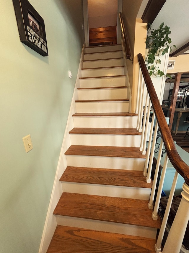 staircase with baseboards