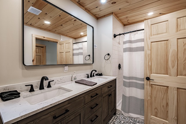 bathroom featuring recessed lighting, wood ceiling, a sink, and double vanity