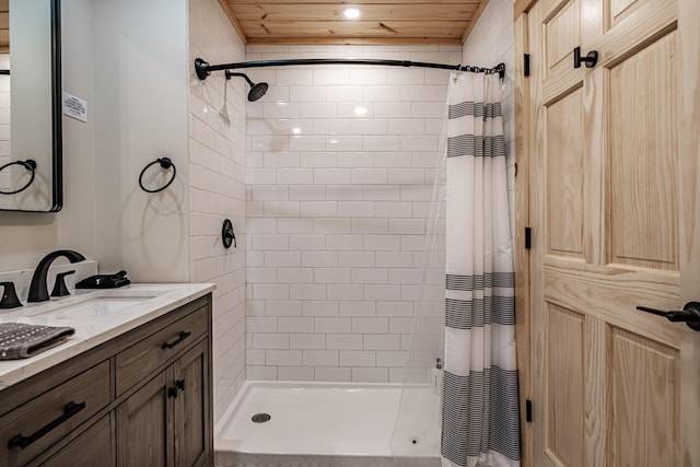 full bathroom featuring wood ceiling and vanity