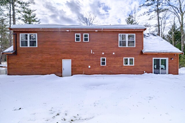 view of snow covered property