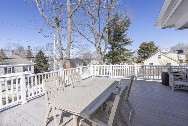 deck featuring outdoor dining area