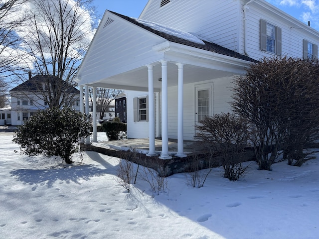 view of snow covered property