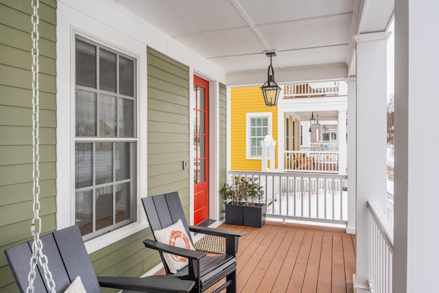 deck featuring covered porch