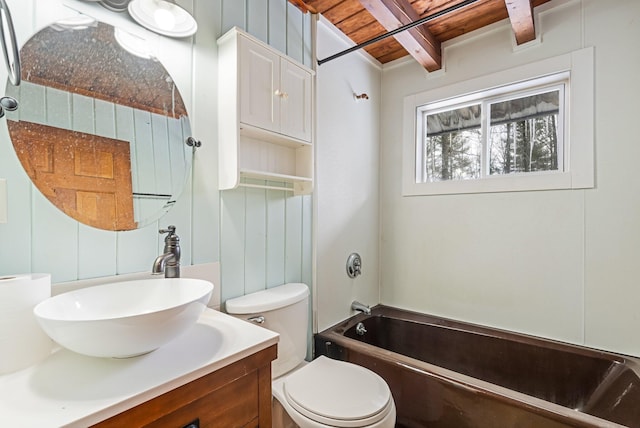 full bath with toilet, vanity, a shower, a bath, and beamed ceiling