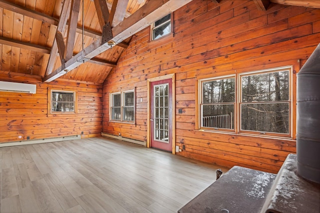 deck with a wall mounted AC and a baseboard radiator