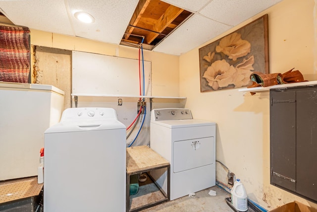 laundry area with laundry area and independent washer and dryer