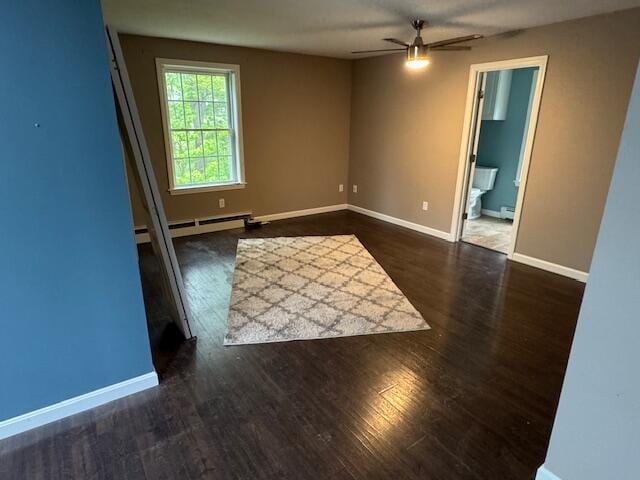 30 Hubbard St, Saco, ME 04072 - unfurnished room featuring ceiling fan, baseboard heating, wood finished floors, and baseboards