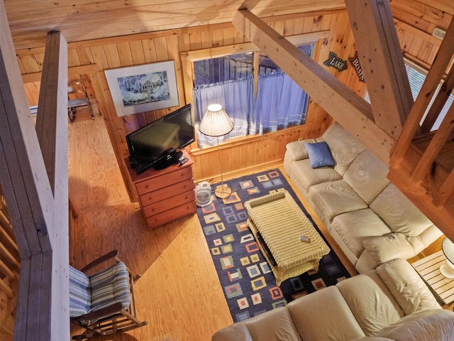 living room with wooden walls