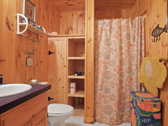 full bathroom featuring curtained shower, wooden ceiling, toilet, wood walls, and vanity