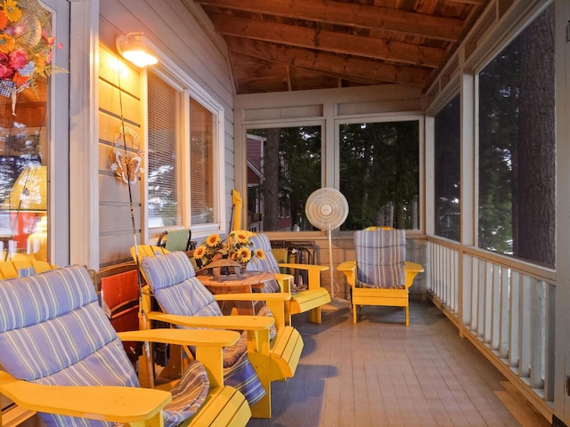 sunroom / solarium with vaulted ceiling