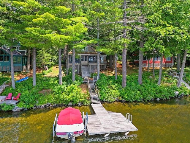 view of dock with a water view and stairway