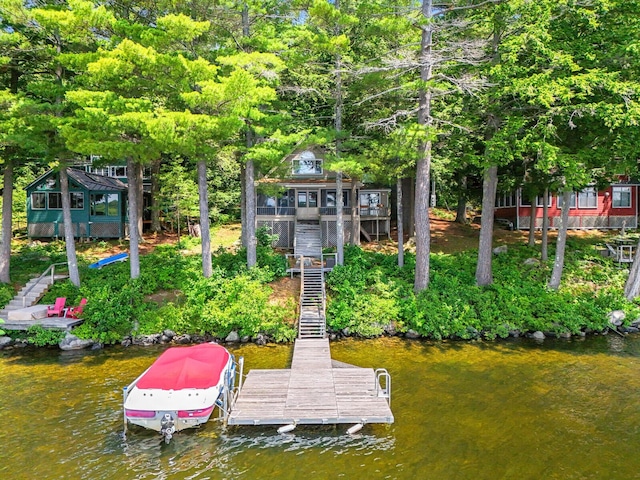 view of dock featuring a water view and stairs