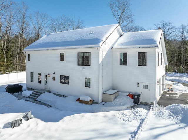 view of snow covered property