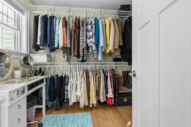 spacious closet featuring wood finished floors