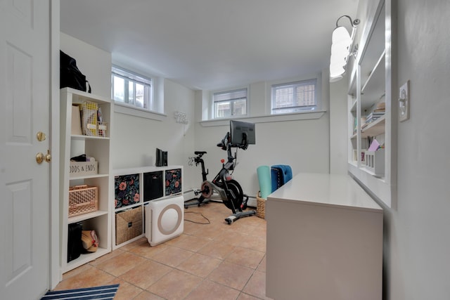 exercise area with light tile patterned floors