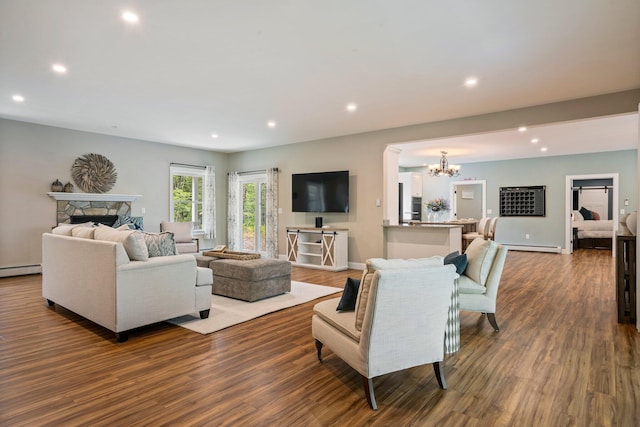 271 Red Gate Ln, Acton, ME 04001 - living area with a chandelier, recessed lighting, dark wood finished floors, and a baseboard heating unit